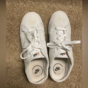 Size 10 women’s Nike slip on sneakers